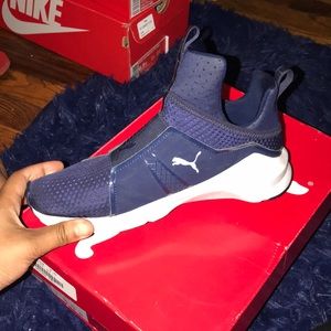 Blue and white pumas